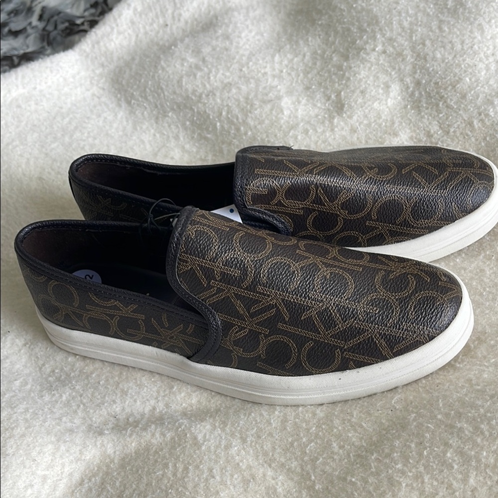Calvin Klein Black and Brown Loafers Sleek Slip-On Design